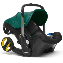 Doona Autostoel Racing Green Met Volledig Geïntegreerd Chassis 2 In 1